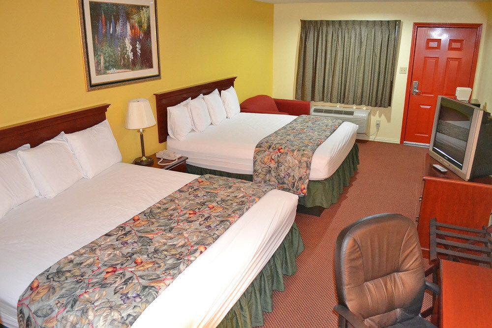 Executive Inn & Suites Magnolia Kültér fotó